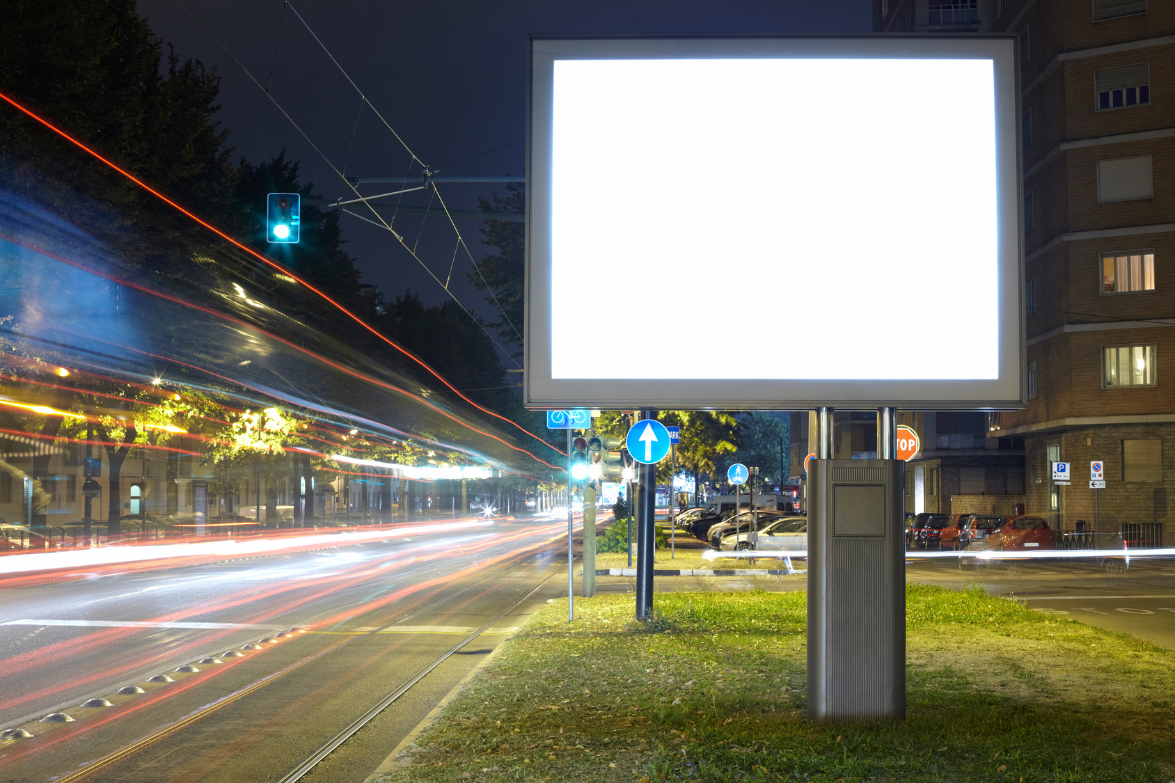 Billboard in the city street, blank screen clipping path included